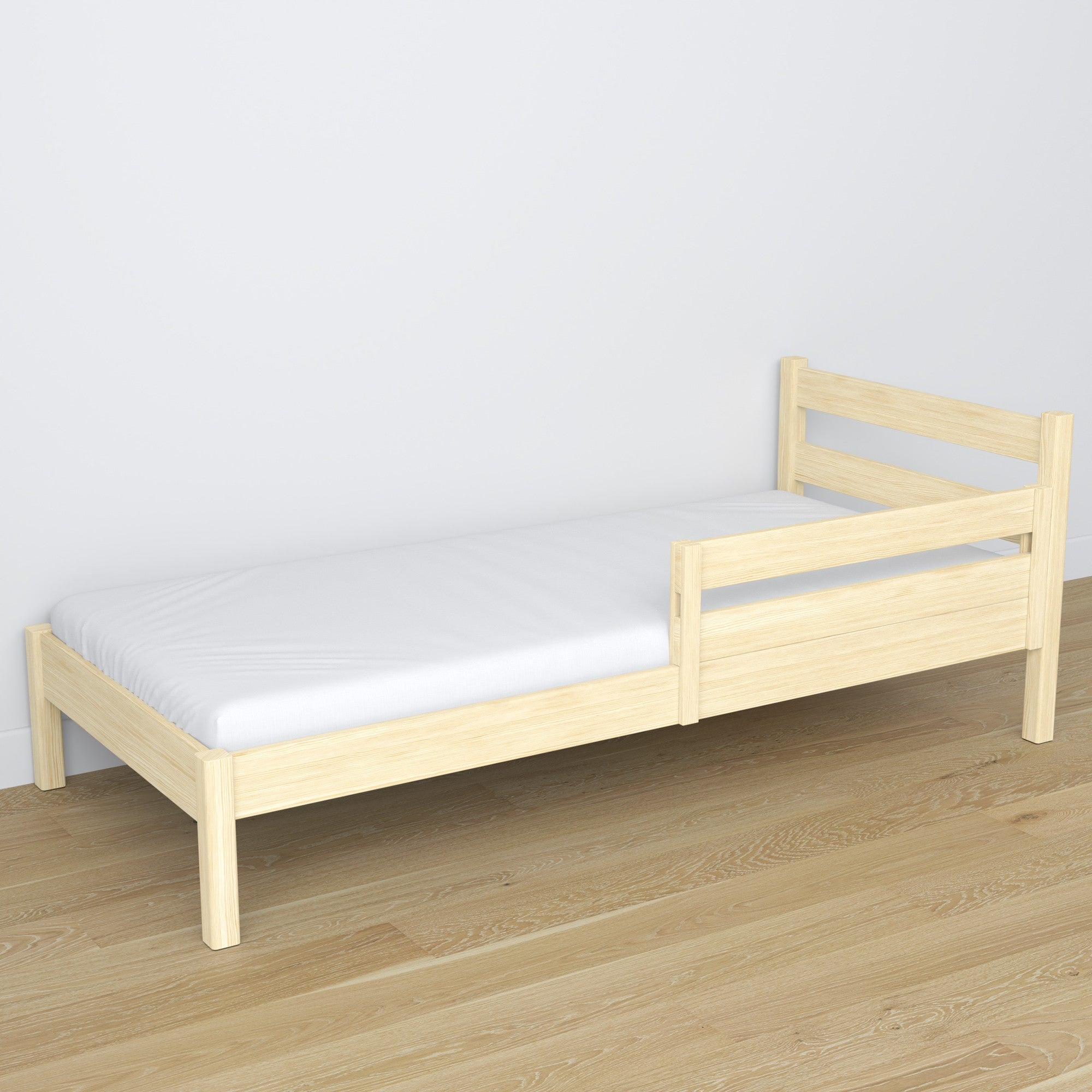 Valbeveiliging transparant grenen gemonteerd op een bed – close-up