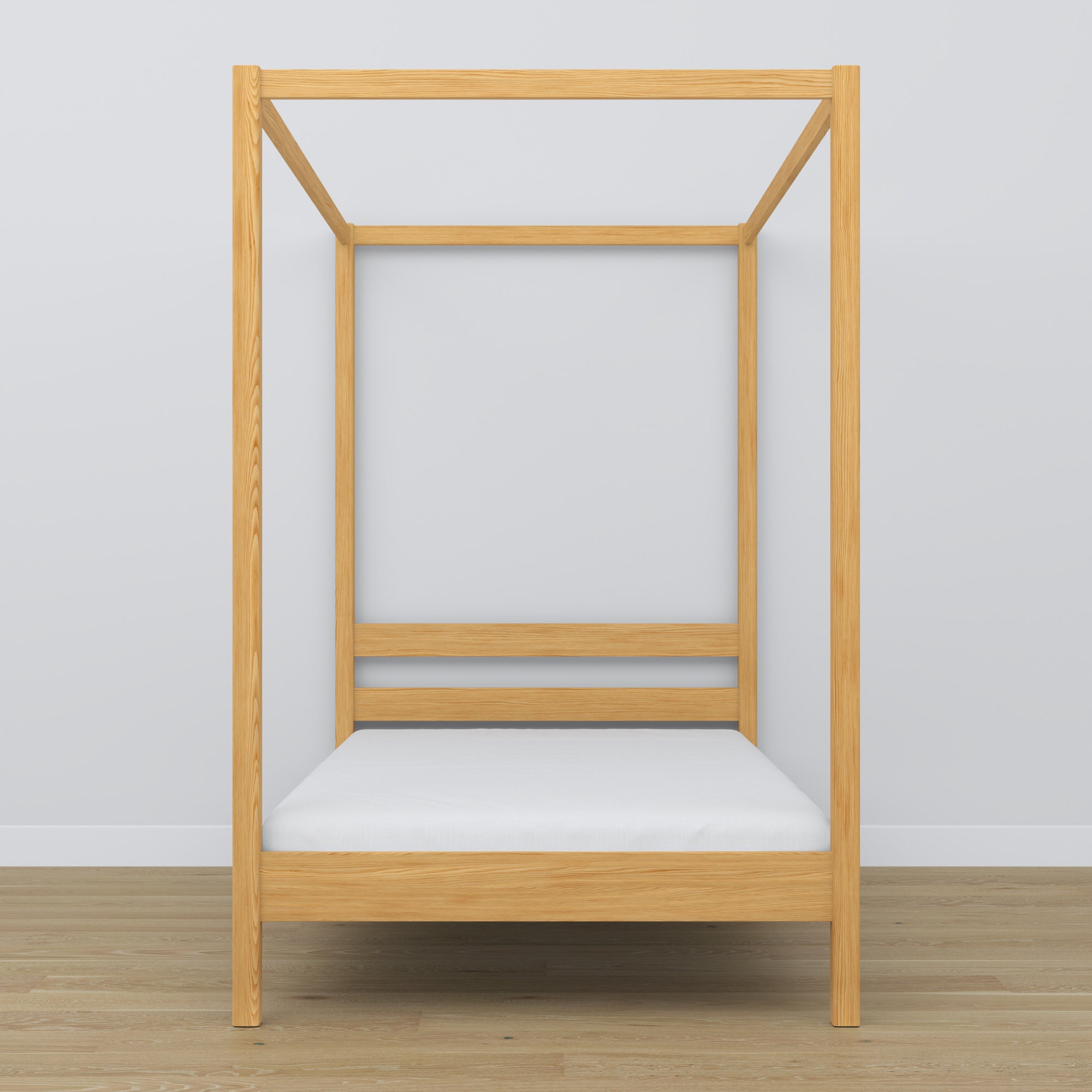 Wooden natural pine canopy bed – close-up of canopy and headboard