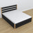 Tweepersoonsbed zwart met eiken – poten en basis van hout, close-up