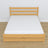 Double bed with wooden drawer natural pine – angled view, scandi bedroom