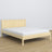 Tweepersoonsbed transparant grenen – houten hoofdbord, close-up van houtwaliteit