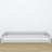 Laag bed grijs in slaapkamer – Scandinavische styling, houten